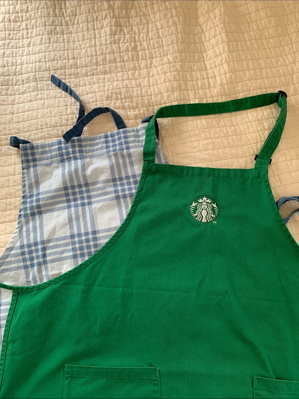 Palaka print apron and Starbucks apron